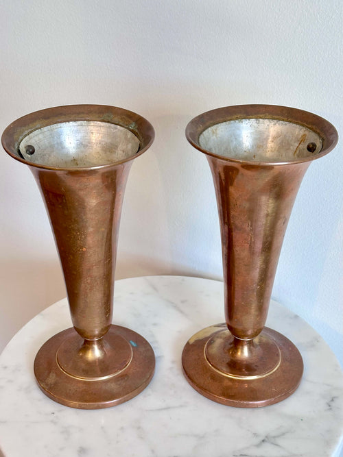 Pair of Vintage Brass Trumpet Style Church Altar Vases displayed on a white marble surface against a plain white wall.